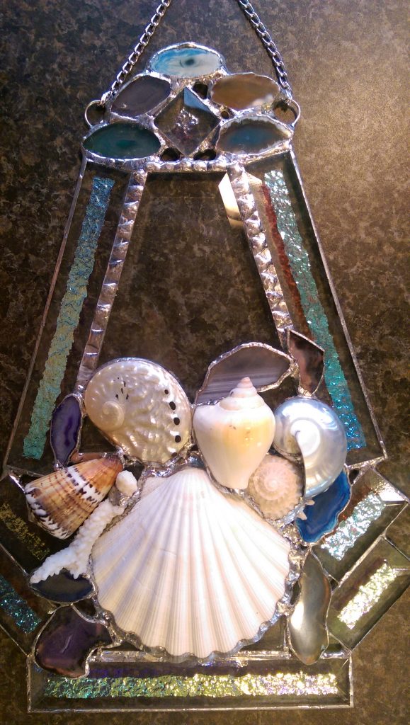 It takes 30 pieces to make this beautiful she'll themed sun catcher by Sherry.